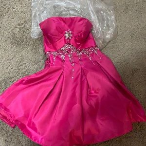 Short pink formal dress.